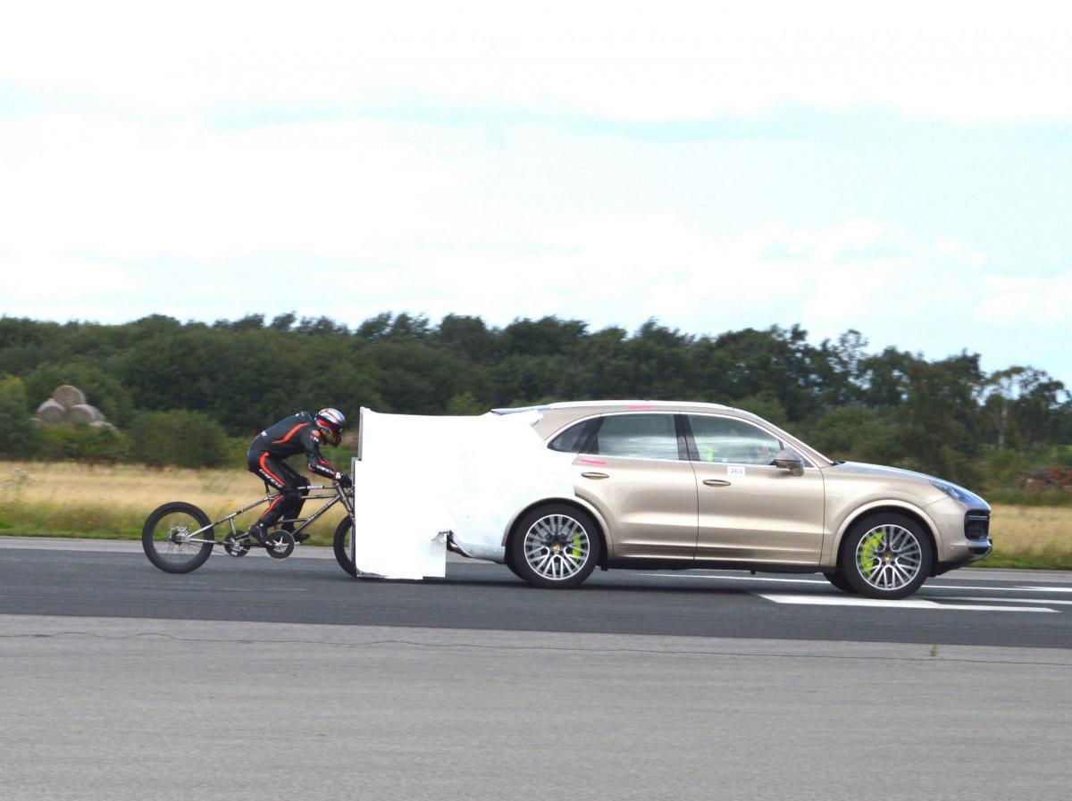 Speed - Neil Campbell, inset, attempting to beat the Guinness Cycling world speed record at Elvington Airfield, Elvington, North Yorkshire. picture: PA