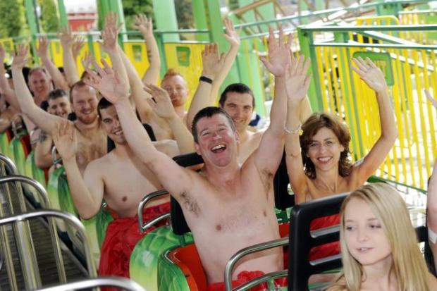 Most people to ride a theme park ride..... naked