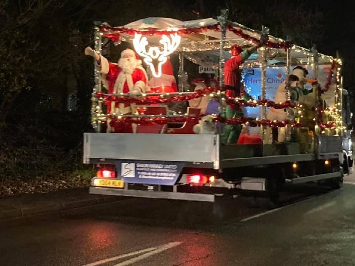 Season of goodwill - the brigades Christmas float, which raised thousands of pounds for good causes