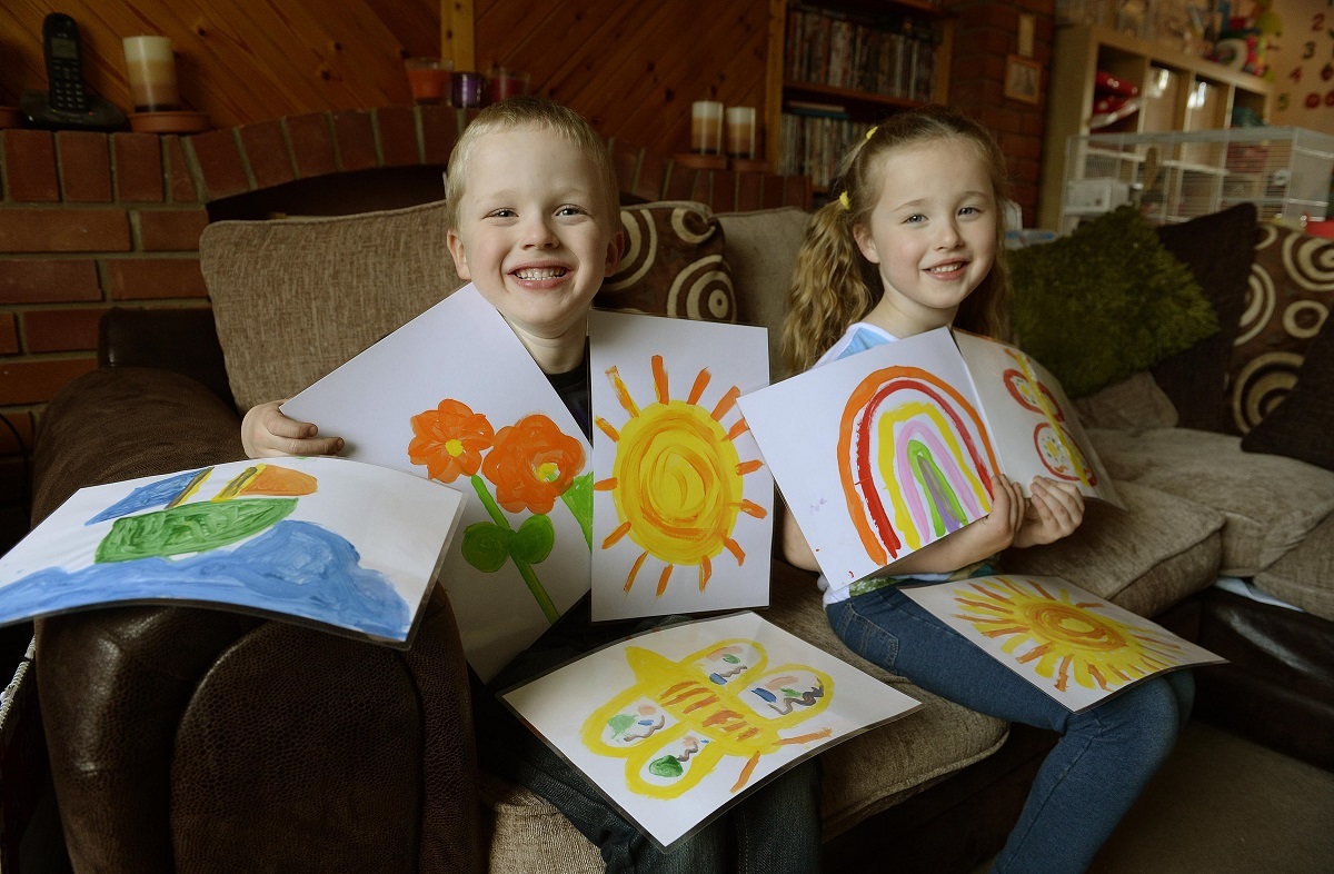 Ray of light - Jamie and Morgan David, five-year-old twins from Lexden, produced happy pictures and sold them for charity after being moved by Comic Relief videos. The smiling siblings are pictured in 2015