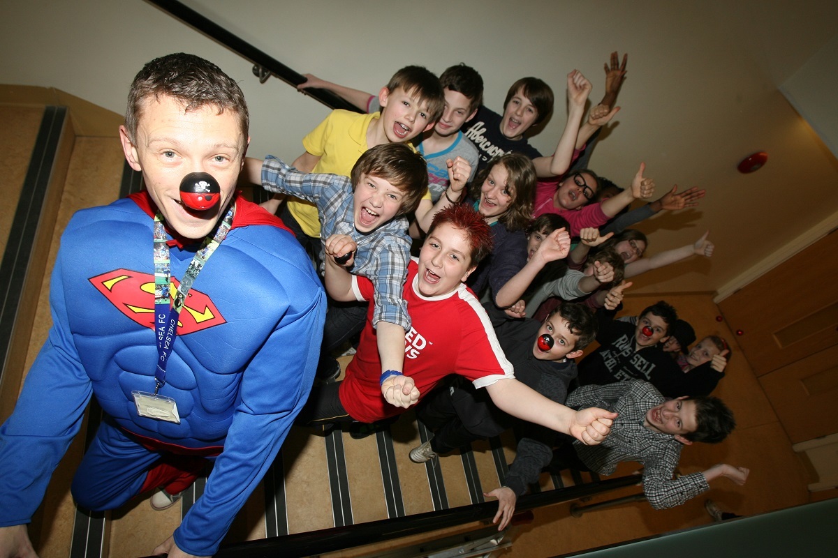 Taking things to a new level - students at Stanway School walked up flights of stairs equivalent to the height of Mount Kilimanjaro, in Tanzania. They are pictured with teacher John Bland in 2011