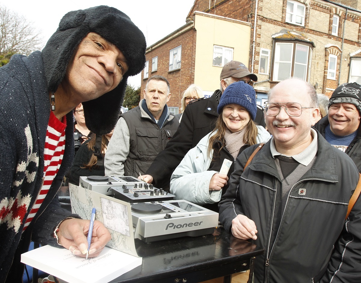 Walton Pier and Lifeboat Station celebrate radio Caroline day with old DJs, Paul Barber signing books on the lifeboat in Walton with Mike Adey 28/3/2014
