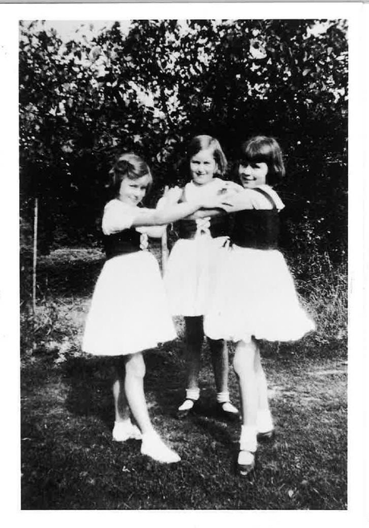 Making a song and dance - these girls look ready to perform. We believe this picture was taken in either the 1920s or 1930s at Mile End School