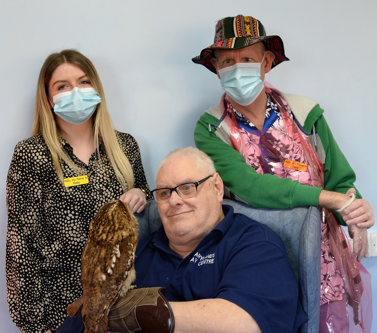Roger Pearce (centre) with Phoenix the Tawny Owl, Katie Craig, Team Leader (left) and Tony Brooke, Key Worker at ECL (right) who is organising all the activities Picture: Warren Page.