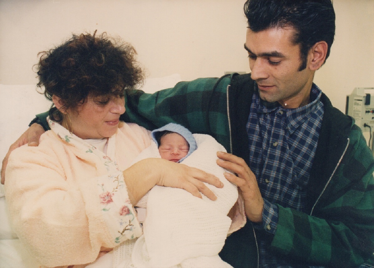 Exciting times - Joyce Humphreys cradles baby Carl, watched by partner Peter. Carl arrived on January 6, 1997