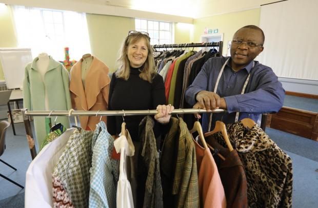 Community - Penny Pancaldi and Roger Byamungu of the Clothing Clinic pre-Covid