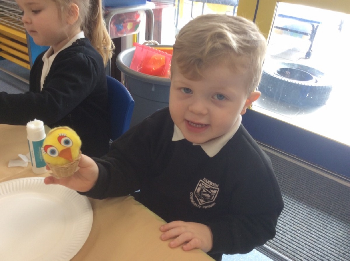 Sneak beak - Archie Norris shows off his Easter chick