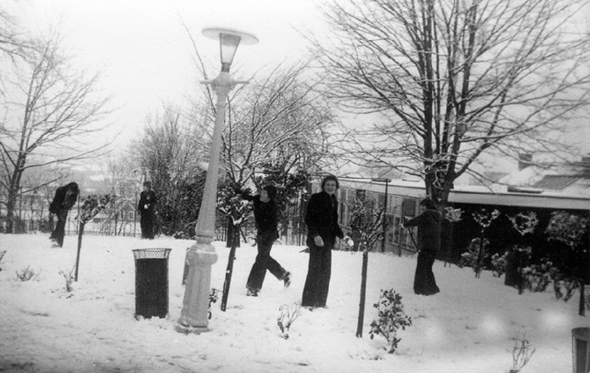 Snowball fight - this fun picture was taken in the 1970s. The old woodwork and metalwork workshops can be seen in the background