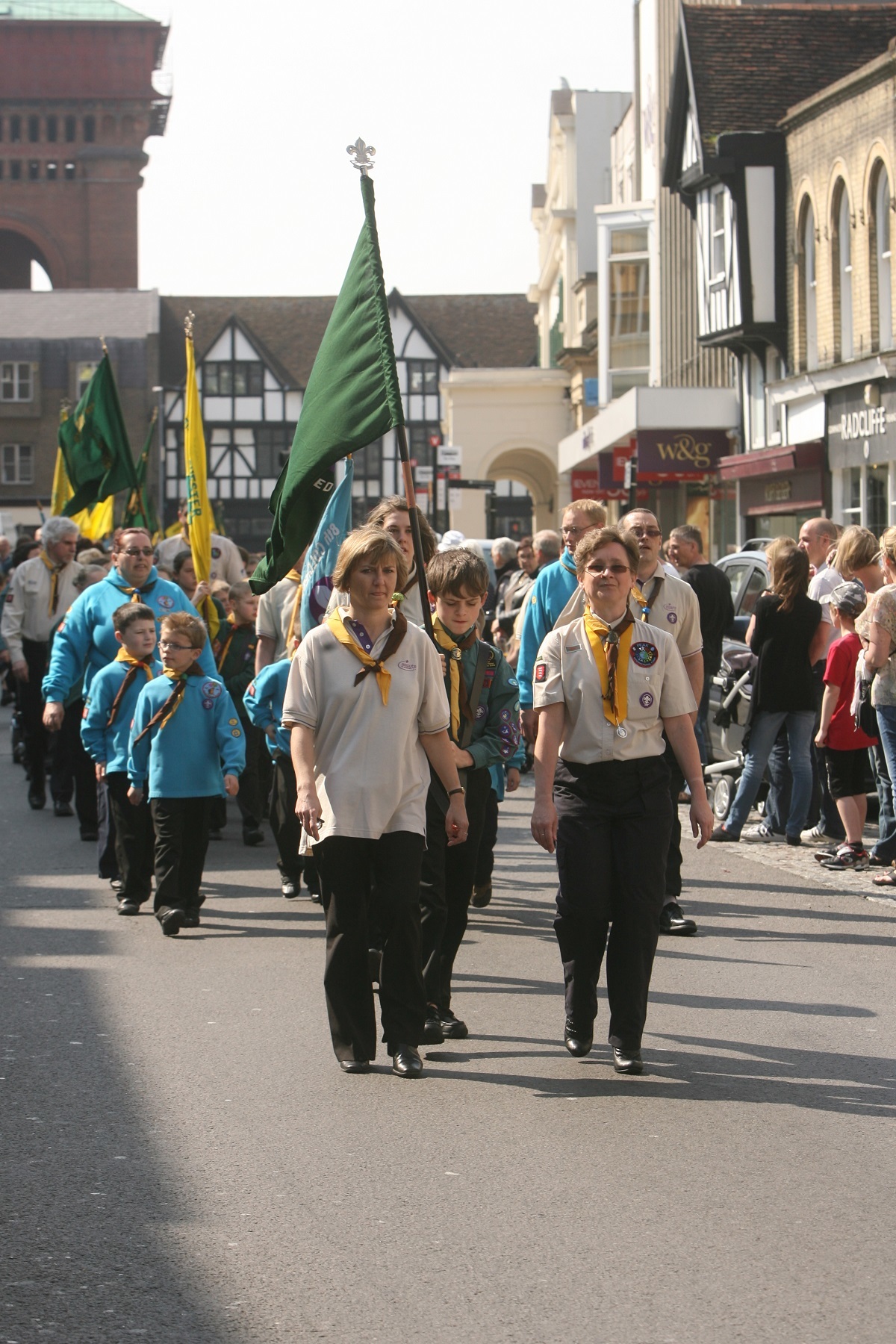 Flying the flag - one of the beaver packs makes its ways down the High Street