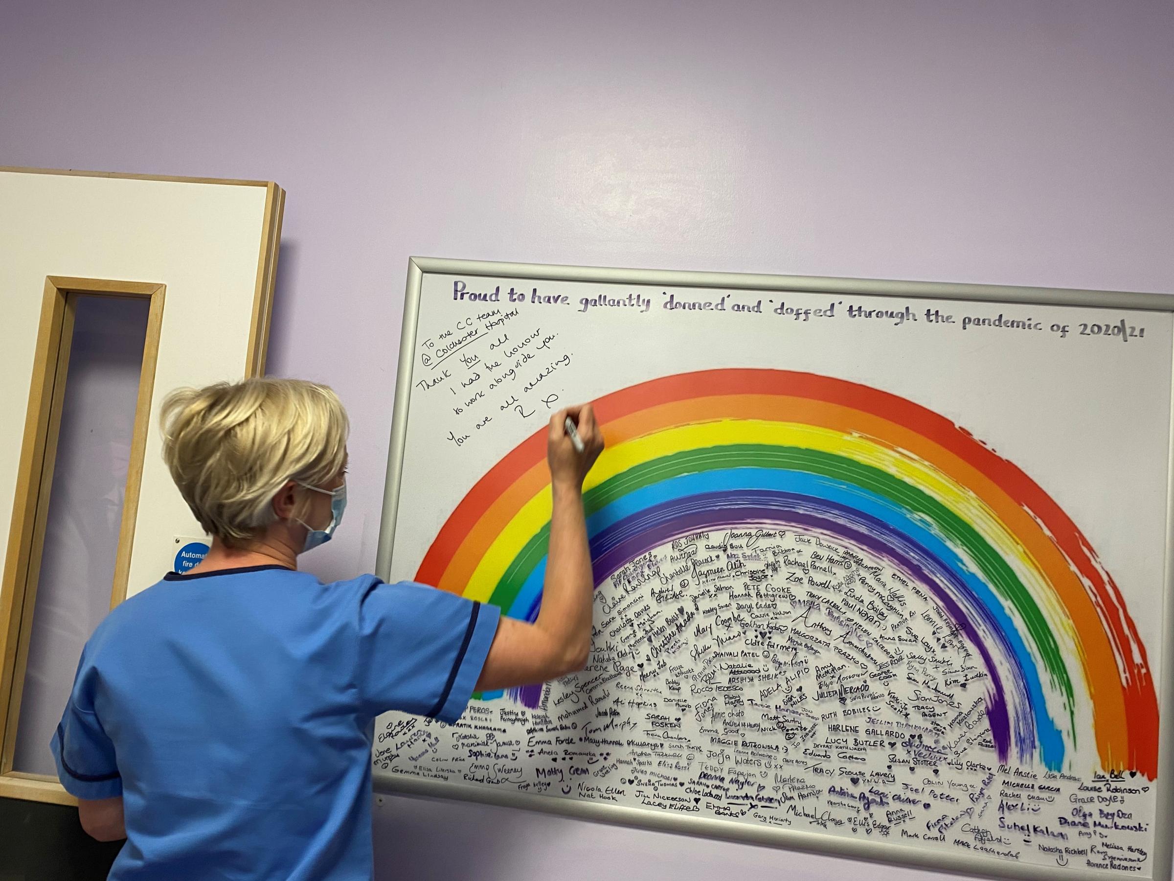 Ruth May signing ICU rainbow