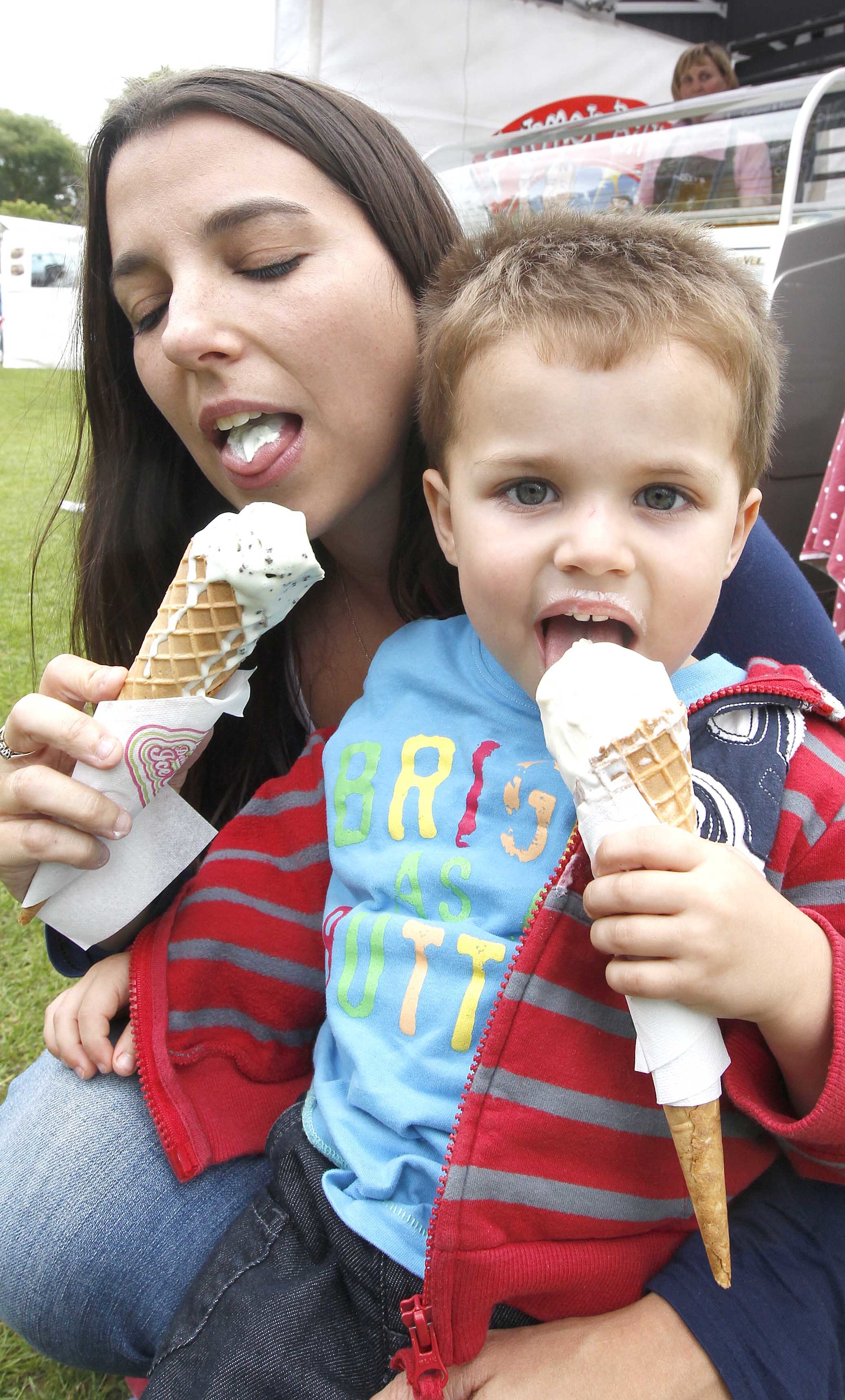 Enjoying a bite to treat - Louisa Hancock with Jake, two, cool down with ice creams