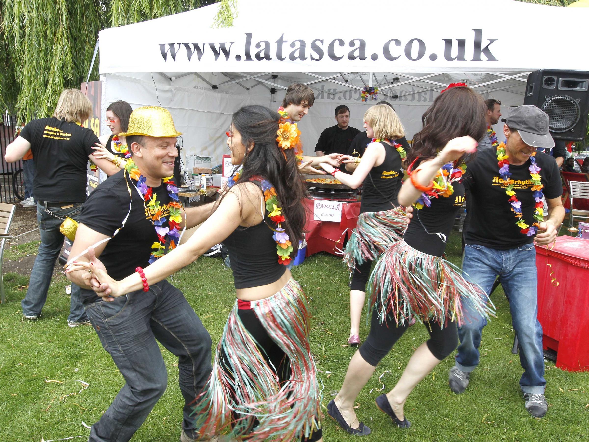 Moving to the music - people dance around the tables at the La Tasca stand