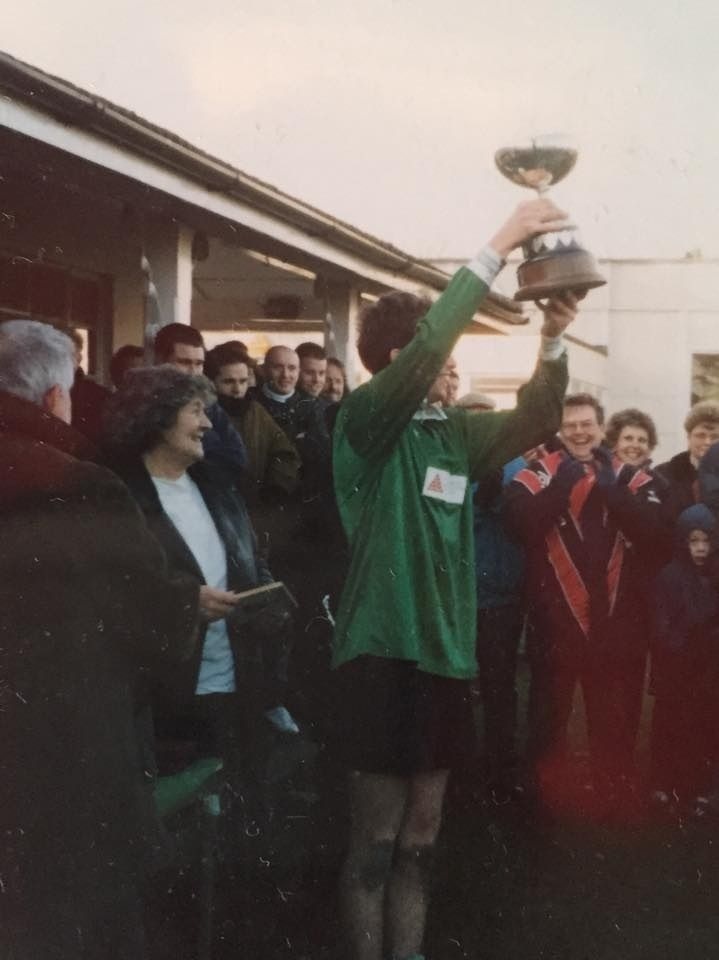 Holding the silverware aloft - Scott Fowler parades the John Fowler Memorial Cup after his Mercian side won the 1994/95 competition