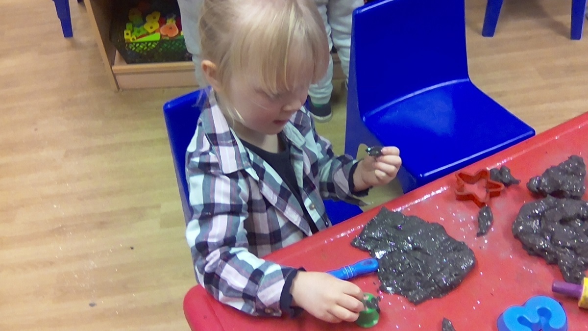 Model pupil - Remmie Ardent and her friends in the Nursery class enjoyed creating frogs, cats and wands, using magical black Playdough. This activity enabled them to develop their language skills