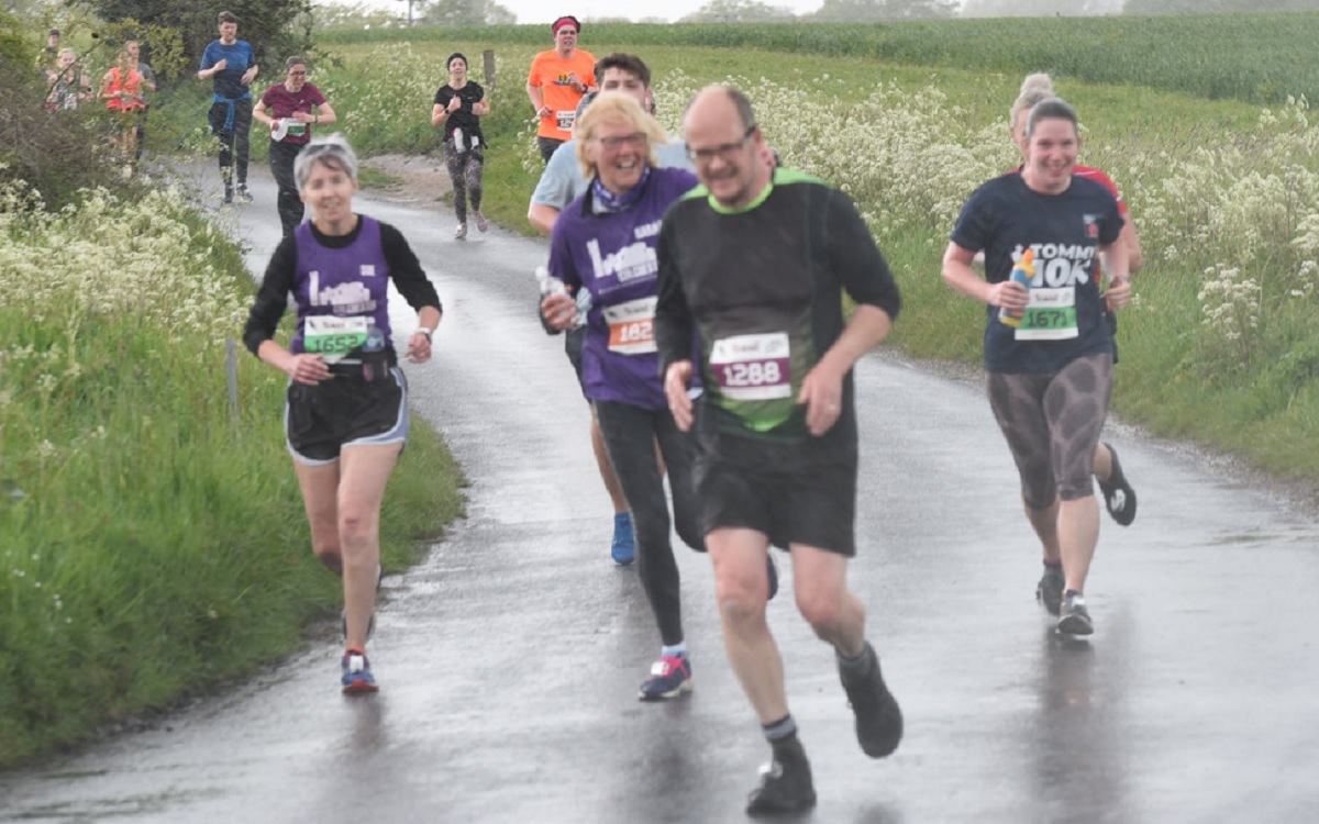 Soggy conditions - runners battle with the elements during Sundays event