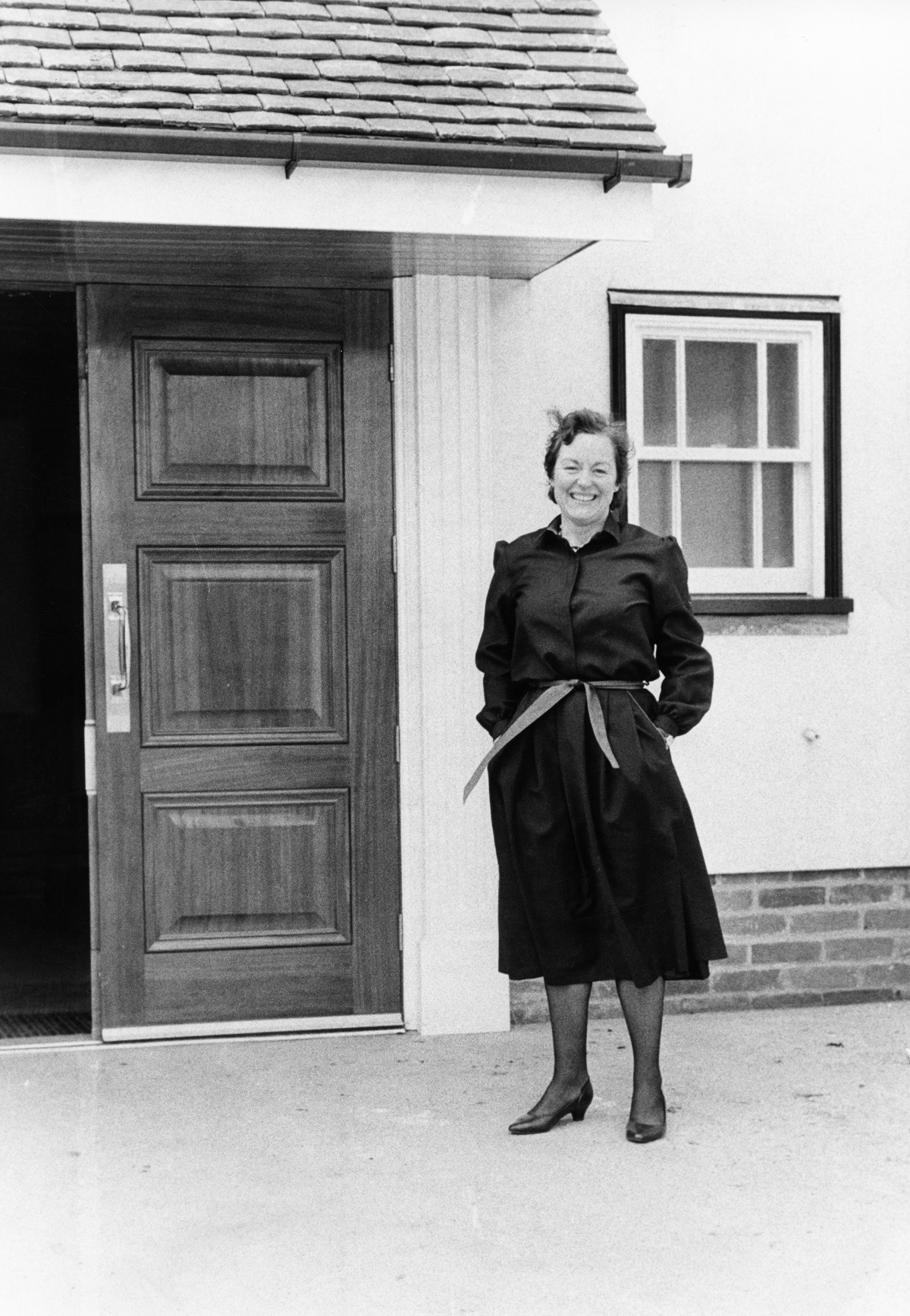 Key player - first medical director Dr Elizabeth Hall in front of the hospice in May 1985