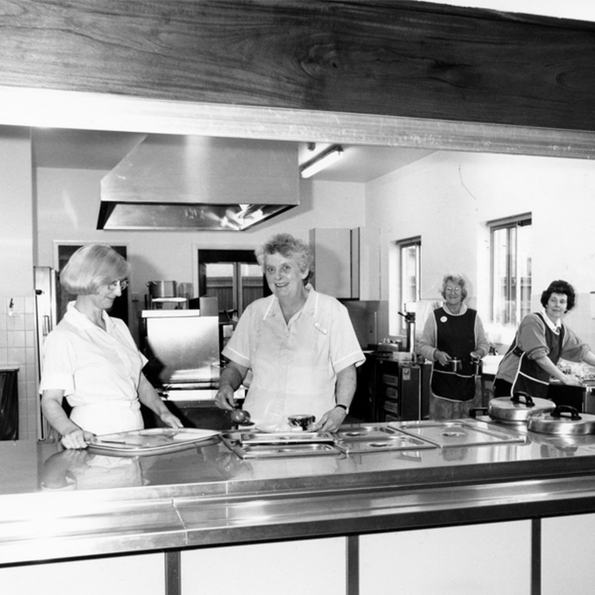 Recipe for success - cook Doreen Hill (centre) and catering volunteers prepare home-cooked meals for patients and their visiting families