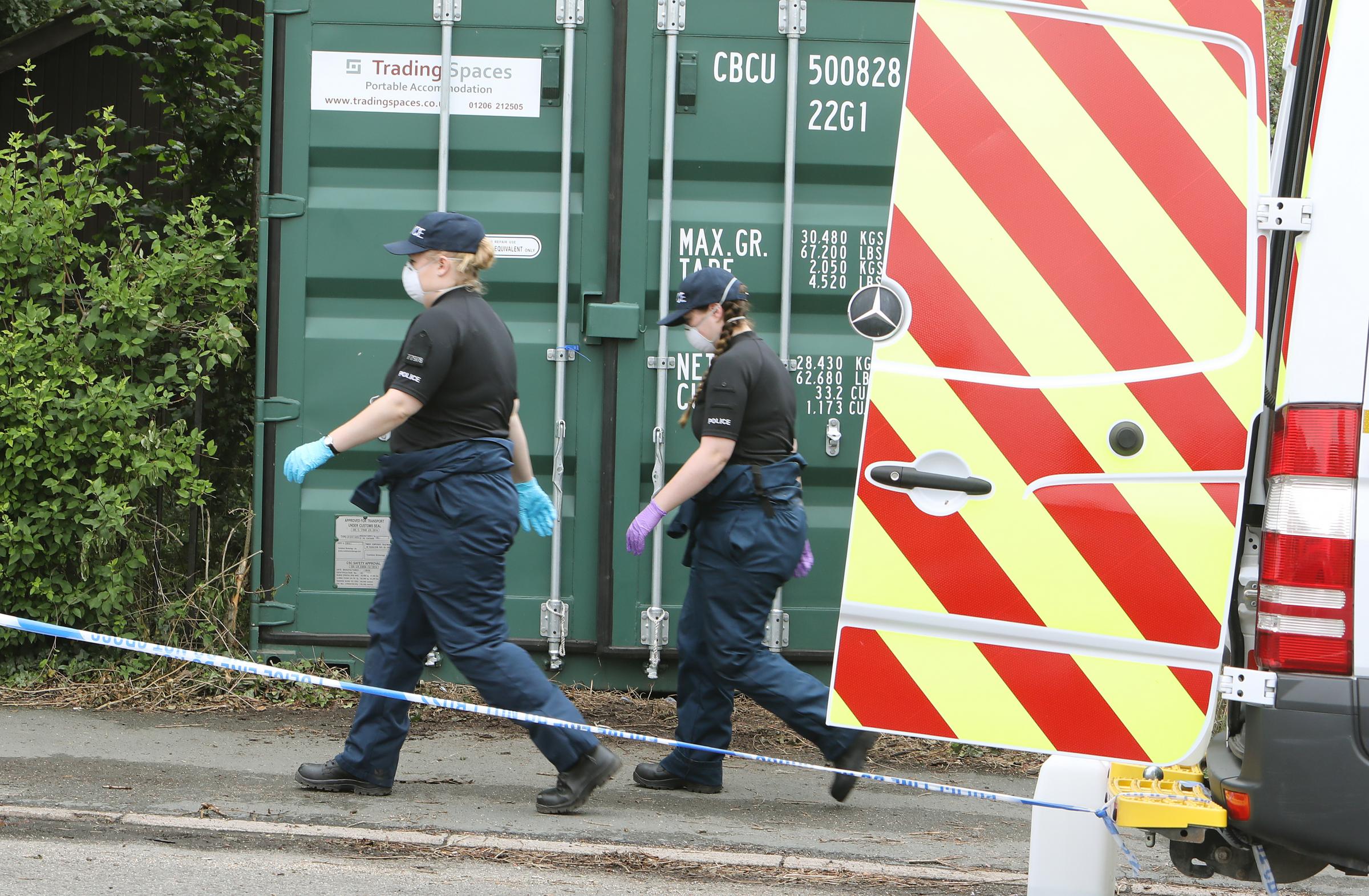 Police search a property in London Road, Copford..