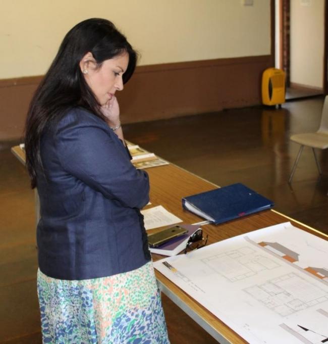 Priti Patel examines the blueprints