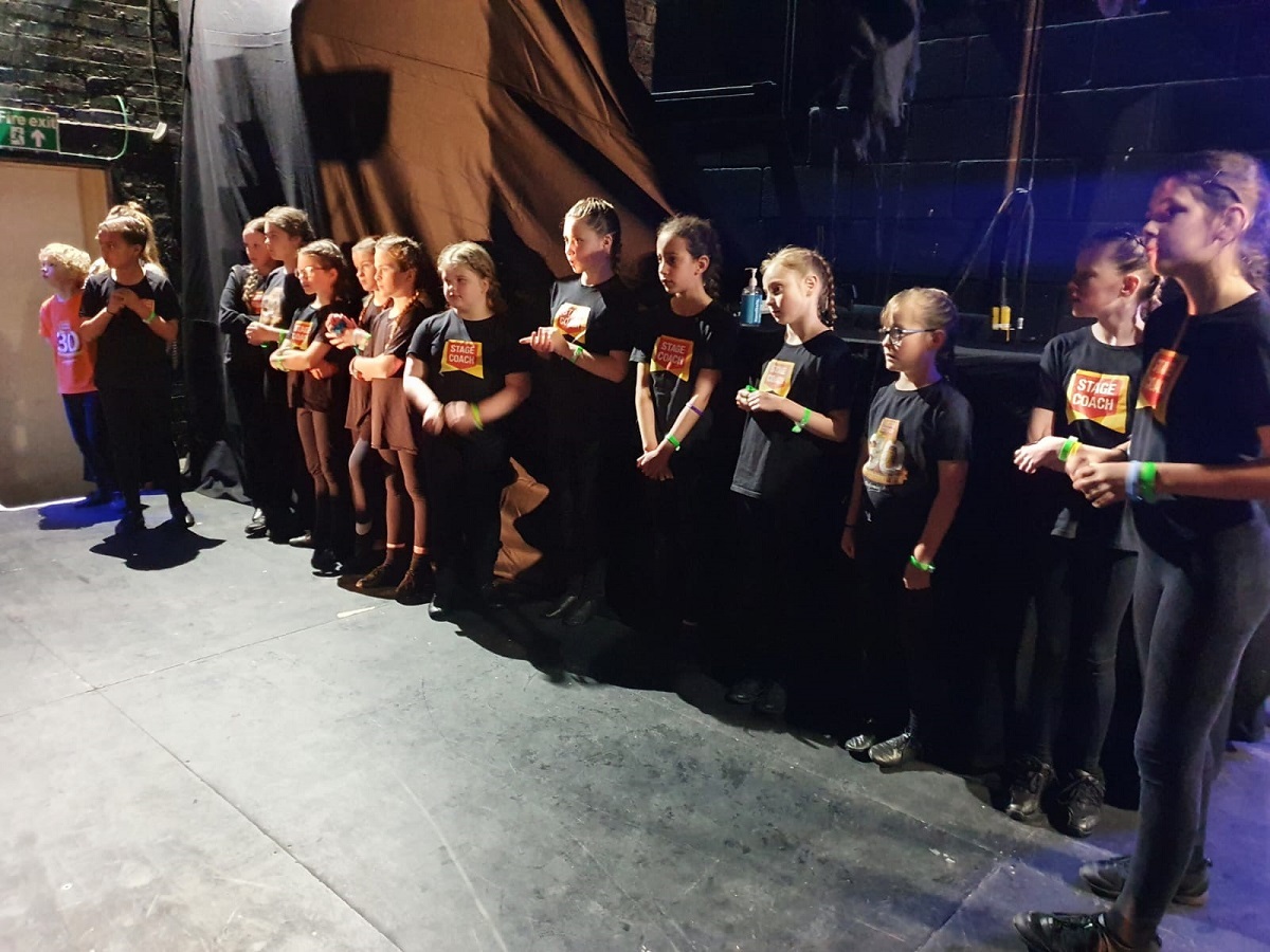 Waiting in the wings - the Colchester students prepare to take centre stage, at the Shaftesbury Theatre