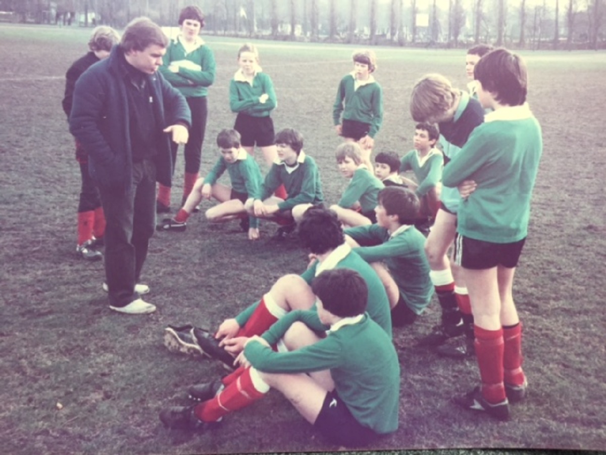 Talking tactics - the students listen to instructions during their tour of Belgium. The side won both games so therefore remain unbeaten in Europe!