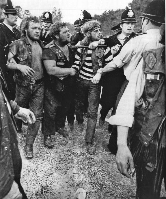Gazette: Mounting tension - police escort a Hells Angel from the site Picture: Ray Clark Gazette: Mounting tension - police escort a Hells Angel from the site Picture: Ray Clark
