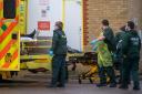 Paramedics transfer a patient from an ambulance into Southend University hospital in Essex. Picture: PA