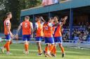 Leaving it late: Aaron Blair celebrates with his Braintree Town team-mates after scoring a stoppage-time equaliser against Bath City.