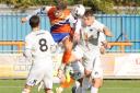 Heads up: Braintree Town striker Will Davies wins a header during his side's 2-0 win over Weston super Mare.