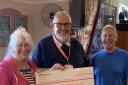 (Left to right) in the photo are Sarah May, Acting President of Bocking Sports Club, Neil Meadows from St. Helena Hospice and John Kittles, Chairman of Bocking Alliance Bowls Club
