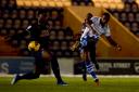 On target - Bradley Ihionvien curls home for Colchester United against Peterborough United