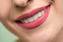 Research by an Essex University psychologist has revealed smiling, even for a split second, makes other faces appear happier