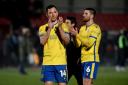 Thanks - Tom Hopper applauds the Colchester United fans following the 1-1 draw at Salford City