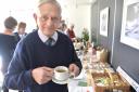 Tony Calder enjoys a coffee