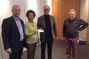 Cheque - Campaign chairman Peter Wilson (second right) with Rotary Club members Mark Howell, Helen Chuah and Austin Hicks