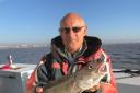 Nice catch - Phil Bingham with a plump codling caught from the Sophie Lea