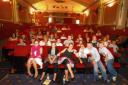 Children from Spring Meadow Primary School sit back and enjoy the movie they made at the Electric Palace Cinema