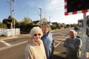 Parish councillors Ernie Osborne and Nick Fairbanks with Joan Pratt at one of the crossings