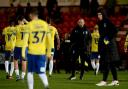 Away day blues - Colchester United boss Matty Etherington with his players after the final whistle at Doncaster Rovers