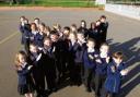 Come on, Olly! Pupils from Howbridge Church of England Junior School, Witham, form an X in support of Olly