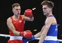 Tussle - England's Lewis Richardson, left, and Scotland's Sam Hickey compete during the Men's Middleweight semi-final boxing bout at the Commonwealth Games in Birmingham Picture: AP PHOTO/RUI VIEIRA