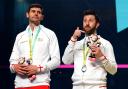 Silver success - England's Daryl Selby and Adrian Waller with the silver medal after the Men's Squash Doubles Medal match at the University of Birmingham at the Commonwealth Games Picture: MIKE EGERTON/PA