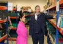Vital - Michael Beckett shows Priti Patel the range of food stock held at the Colchester Foodbank