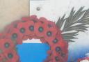 A wreath of red poppies was laid next to blue cornflowers, which is the French flower for Remembrance as they also grew alongside poppies in Flanders.