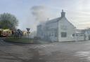 Local village pub seen in flames