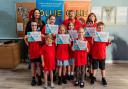 Fantastic - School pupils with their certificates in front of Liz Baker, Ali Knowles, and Caroline Chipper
