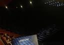 The stage and provided programme at Mercury Theatre, Colchester.