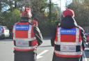 A pair of security guards working under Operation Vanguard, passing through the Sainsbury's car park, patrolling in Braintree town centre, 27 October 2026.