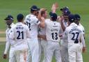 Star man - Essex's Simon Harmer is congratulated by his team-mates after taking the wicket of Andrew Umeed Picture: GAVIN ELLIS/TGSPHOTO