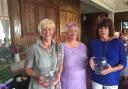 Winning duo - Ginny Richardson (left) and Sally Caerns (right) with Frinton lady captain Marilyn Clarke